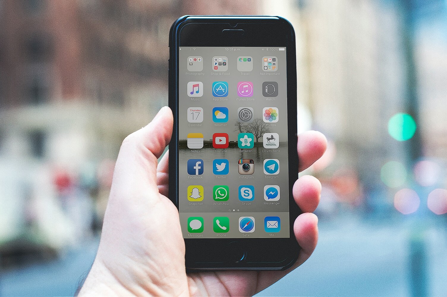 Image of phone with apps to represent brand content development